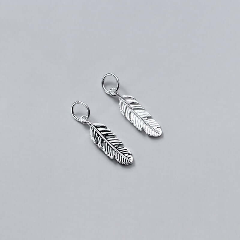 "Handcrafted feather pendant charm for DIY jewelry making"