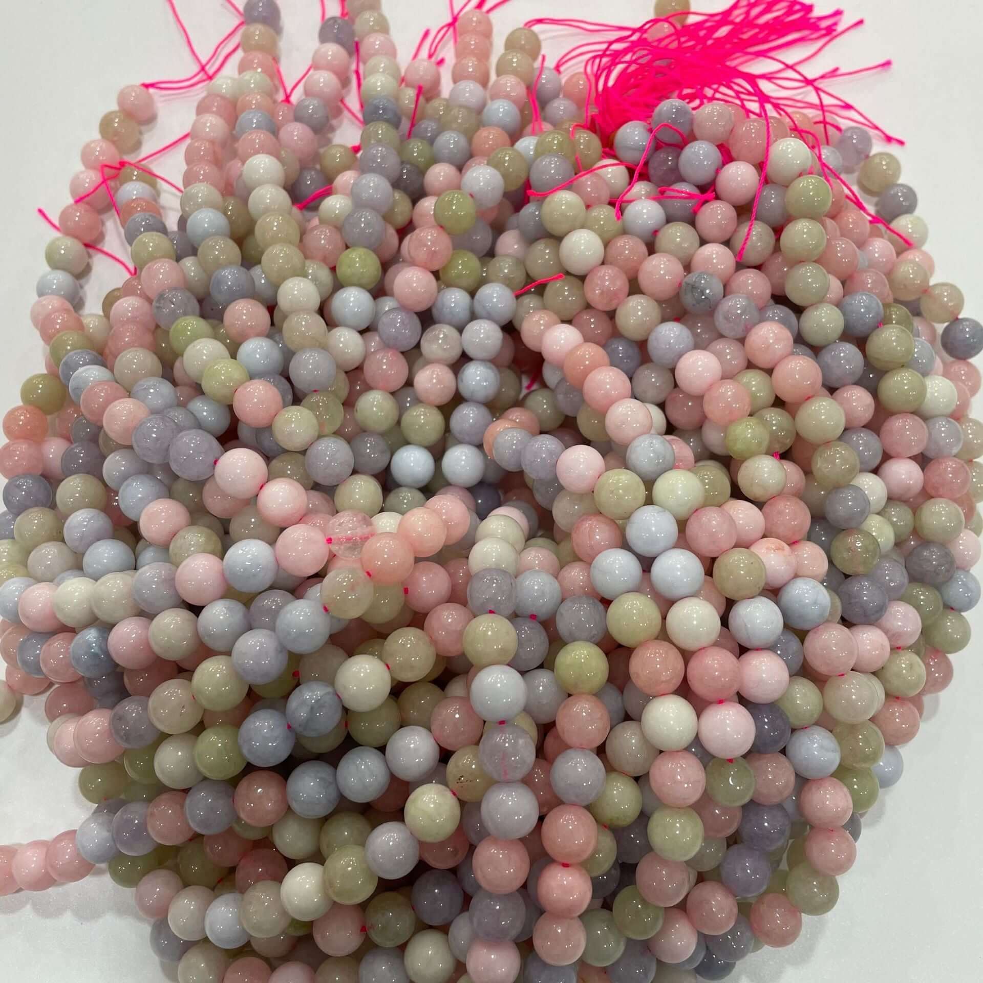 Morganite loose beads in various pastel colors for DIY handmade jewelry crafting.