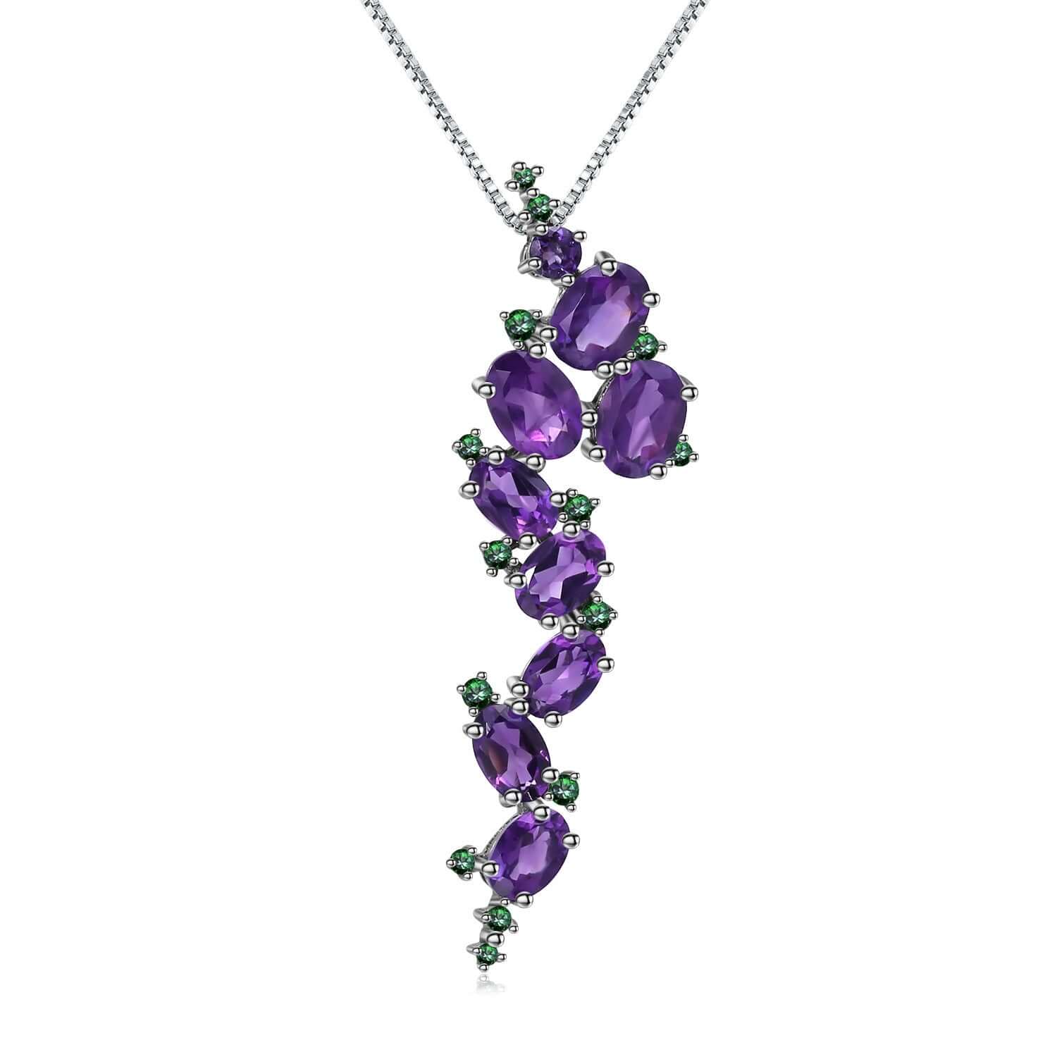 Purple gemstone necklace with green accents on a white background