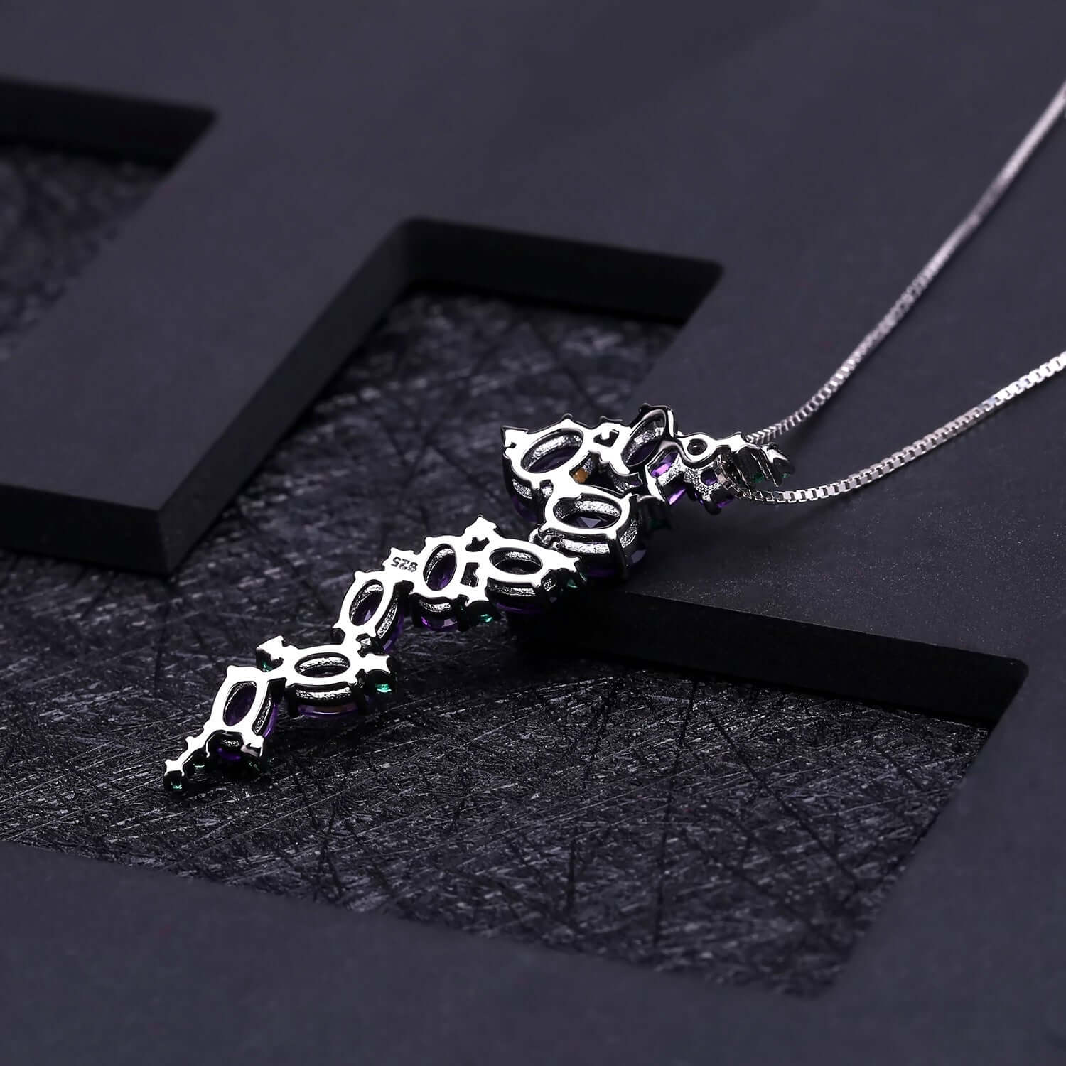 Handmade statement accessory with oversized inlaid amethyst detail