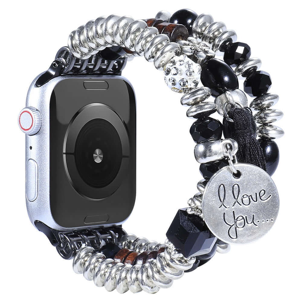 Handmade jewelry tassel strap for Apple Watch featuring beads and a charm that says 'I love you'.