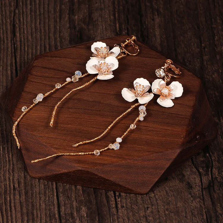 Unique handmade jewelry earrings featuring sparkling zircon and tassels