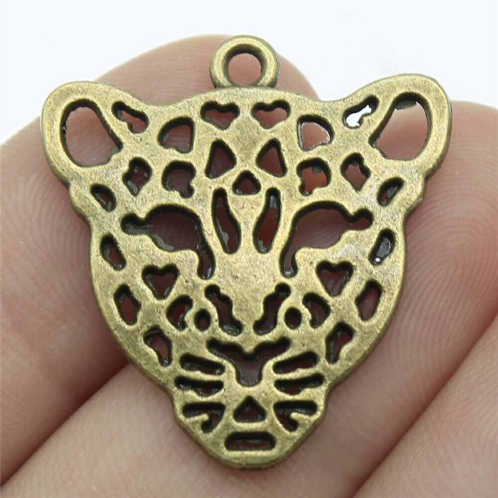 DIY handmade leopard head pendant in antique bronze, ideal for jewelry accessories projects.